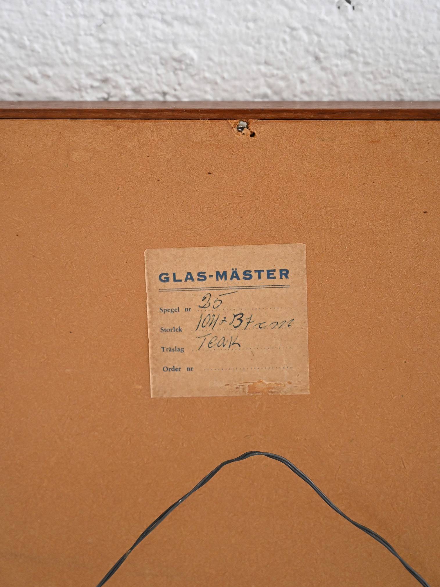 Vintage half-bust mirror with wooden frame