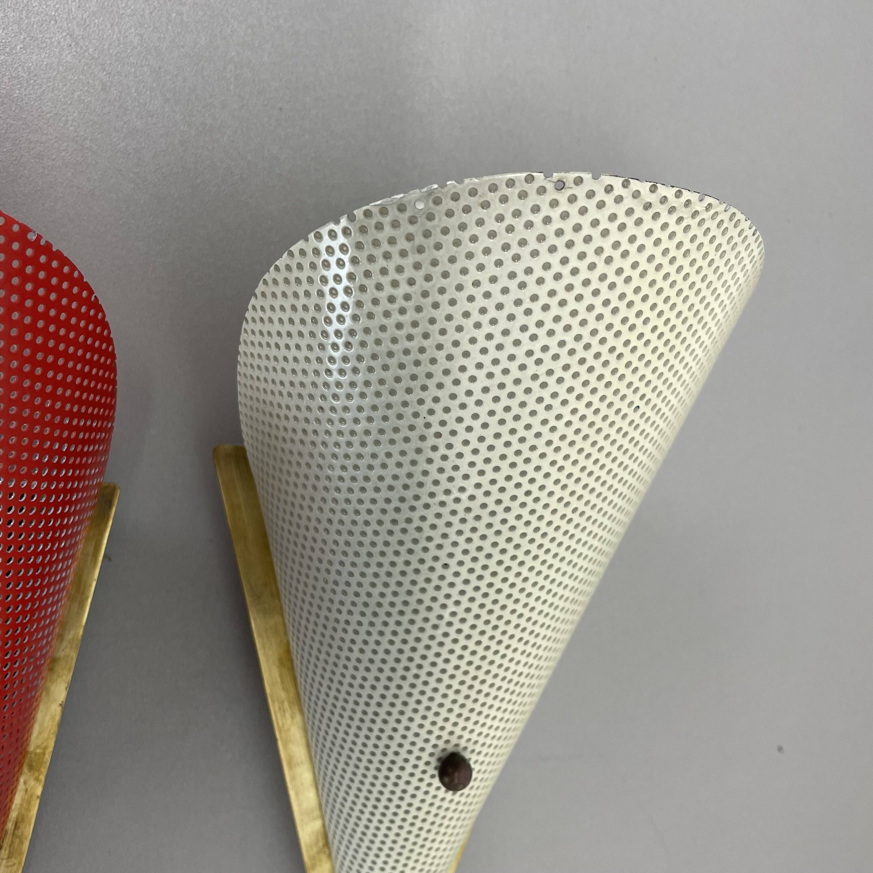 Set of two hole pattern theatre wall light sconces, france, 1950