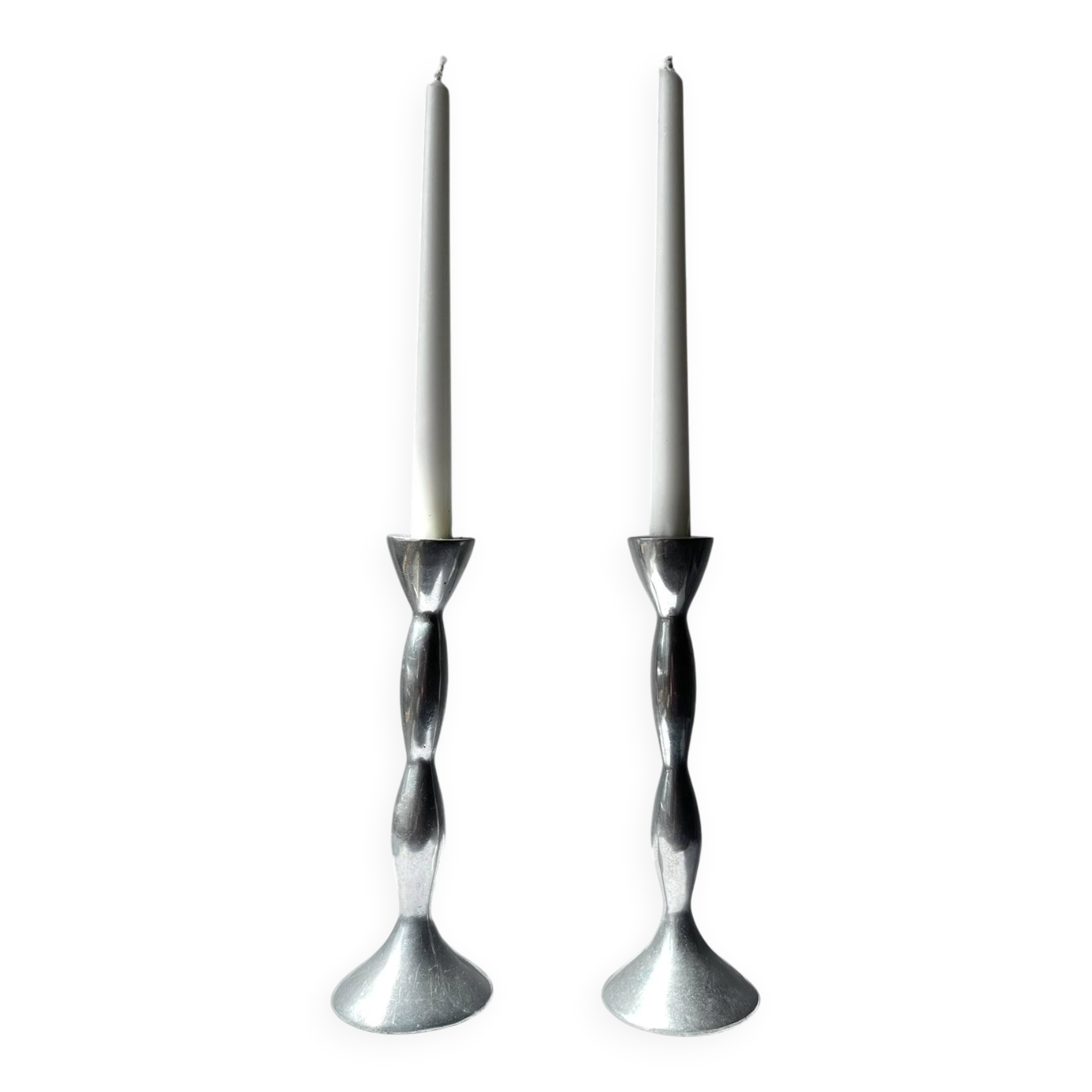 Pair of wavy aluminium candle holders