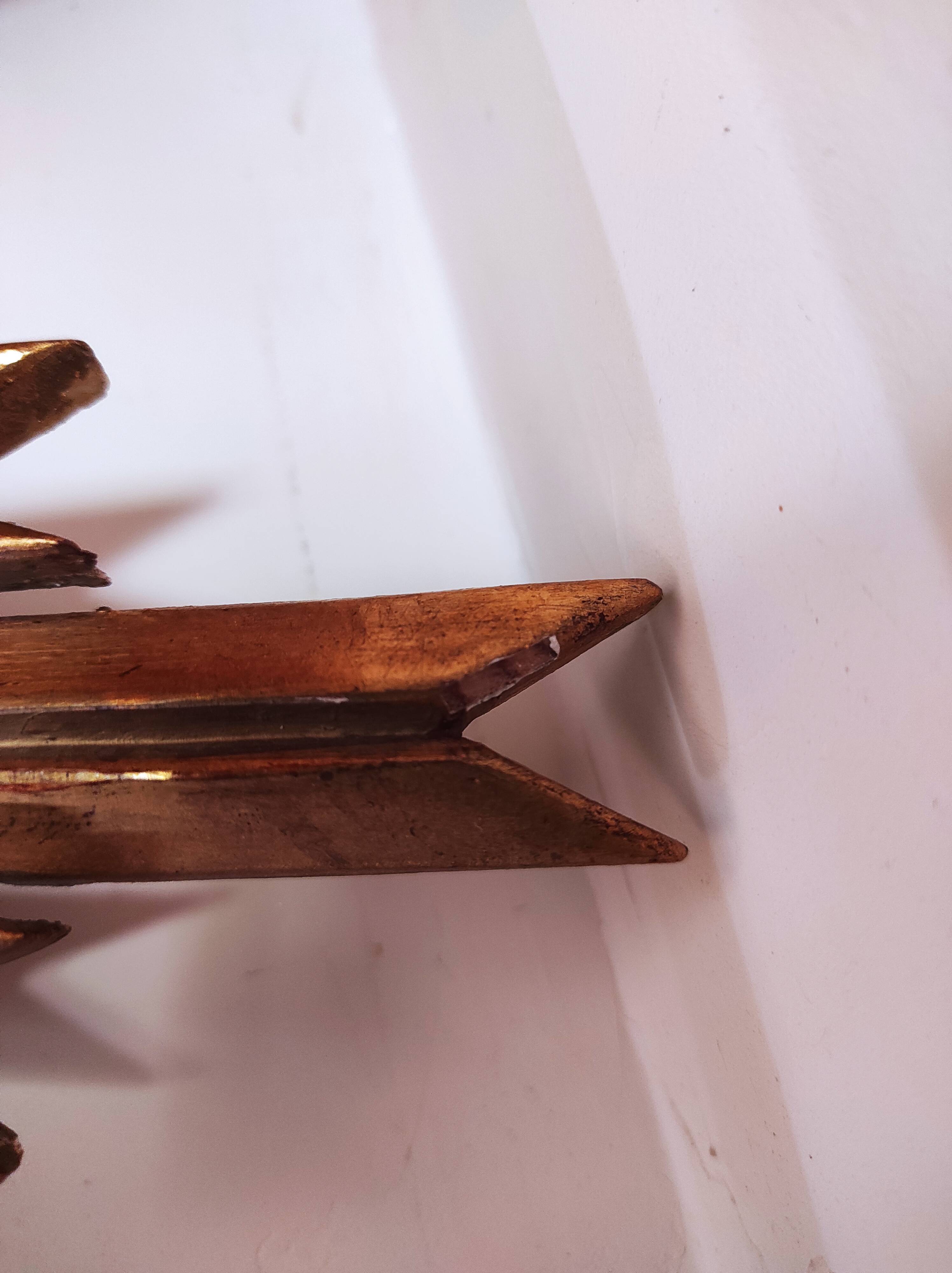 Sun mirror and witch's eye in gilded wood