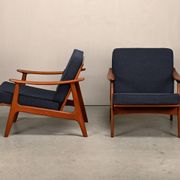 Pair Scandinavian Modern armchairs in teak and dark blue bouclé fabric