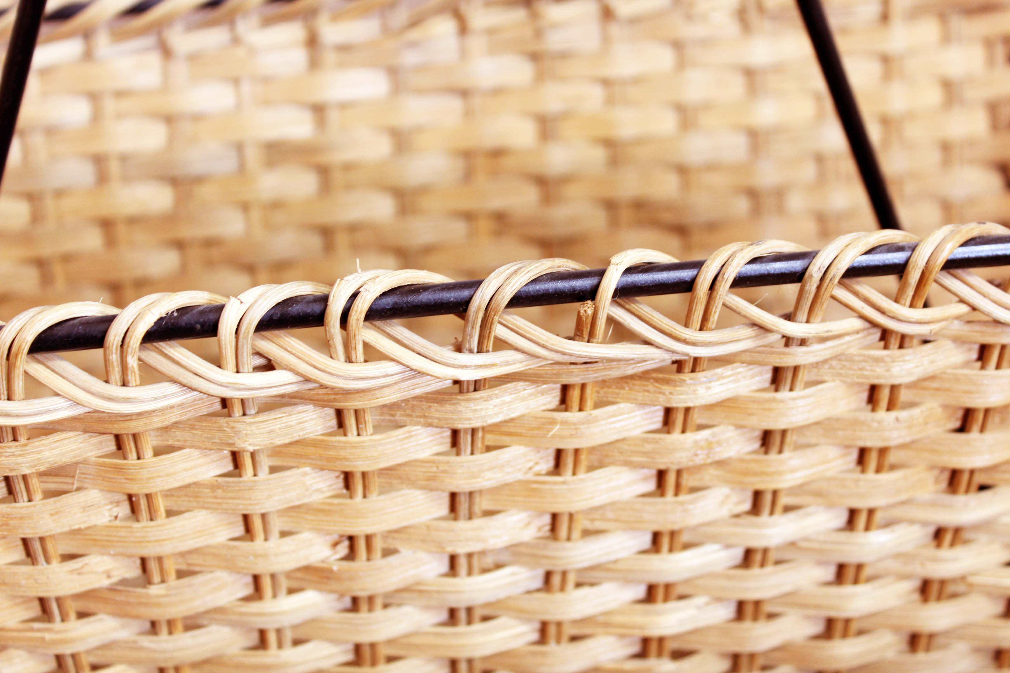 Vintage wicker magazine rack