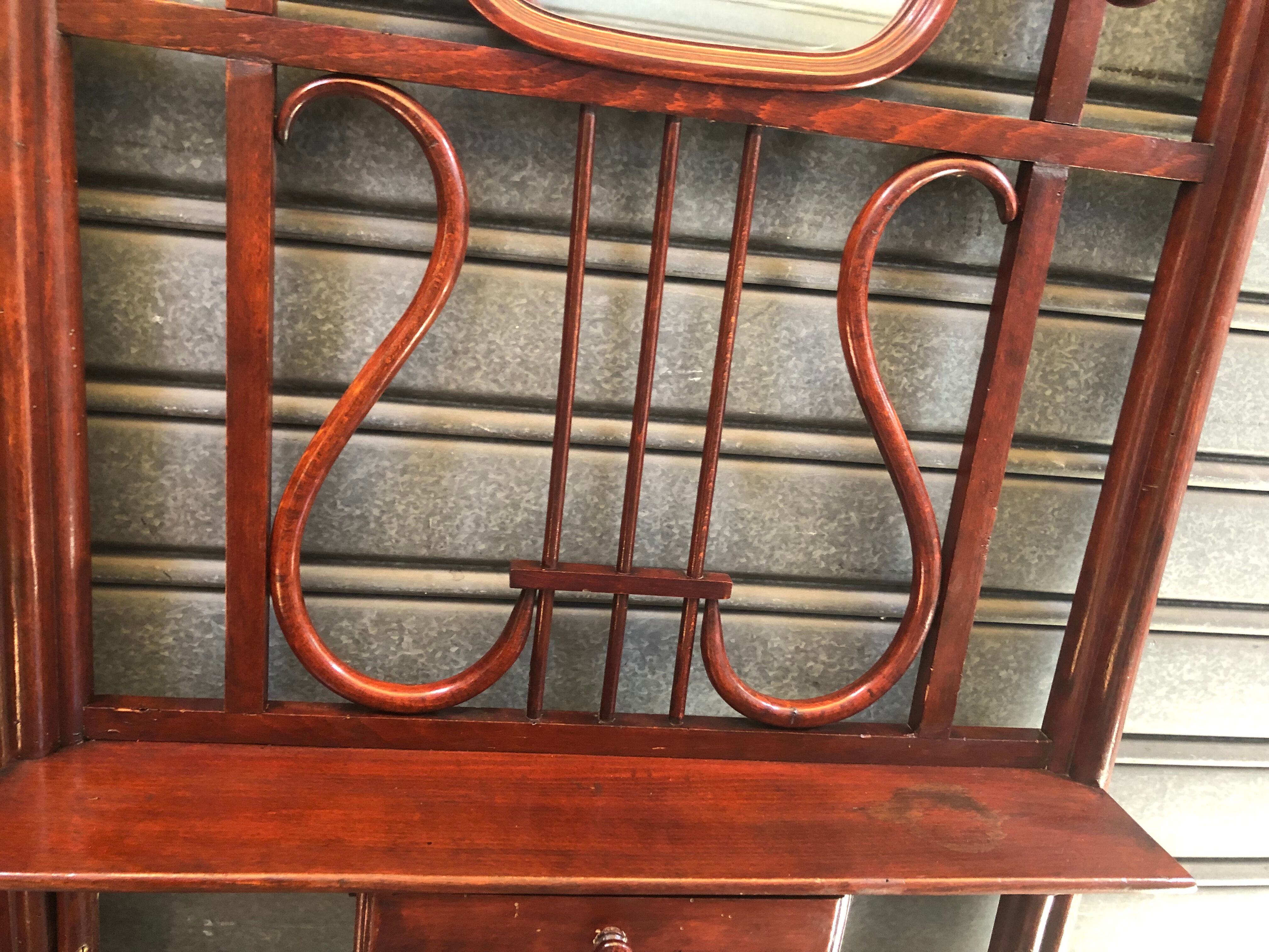 Wall coat rack in curved wood 1900 mahogany color