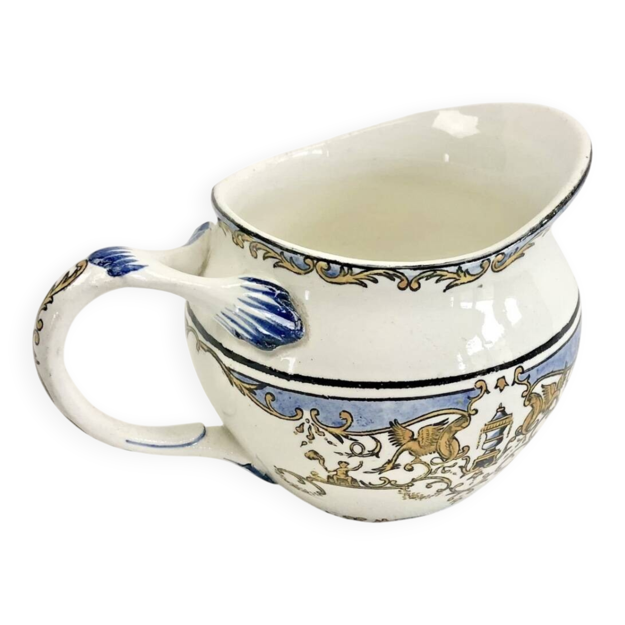 Old cream jug for children at the Dionysos press Gien