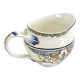Old cream jug for children at the Dionysos press Gien