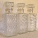 Three carafes for whiskey