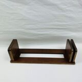 Old bookends in mahogany and modular brass