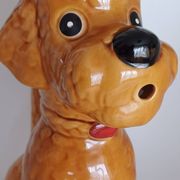 Ancient ceramic pitcher in the shape of a poodle.