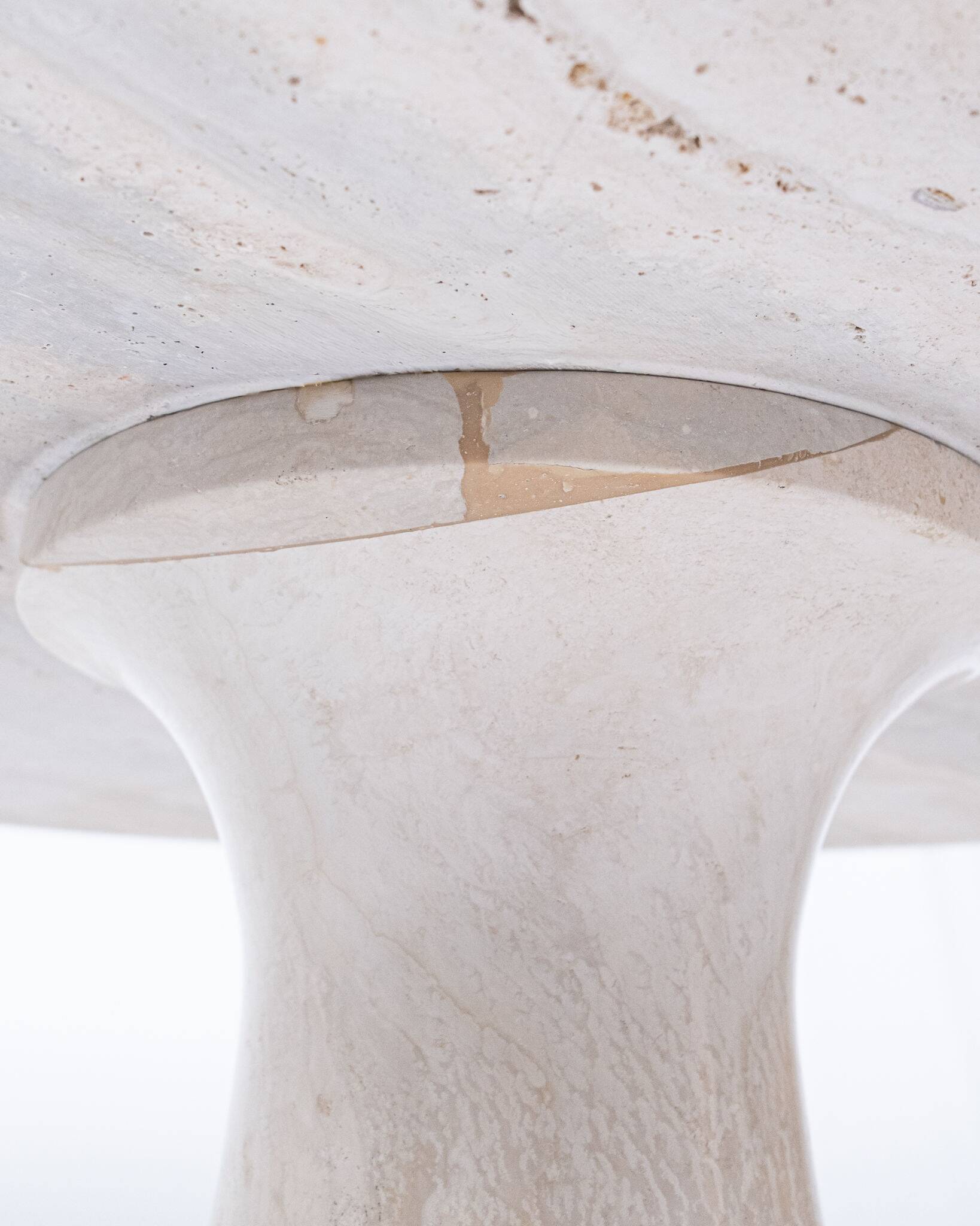 Pedestal dining table in travertine, Stone International, Italy, 1970s
