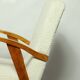 Fauteuil en bois et tissu bouclette beige clair restauré, design Puchala 1970