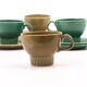 Set of 4 green and khaki Sunbeam cups and saucers.