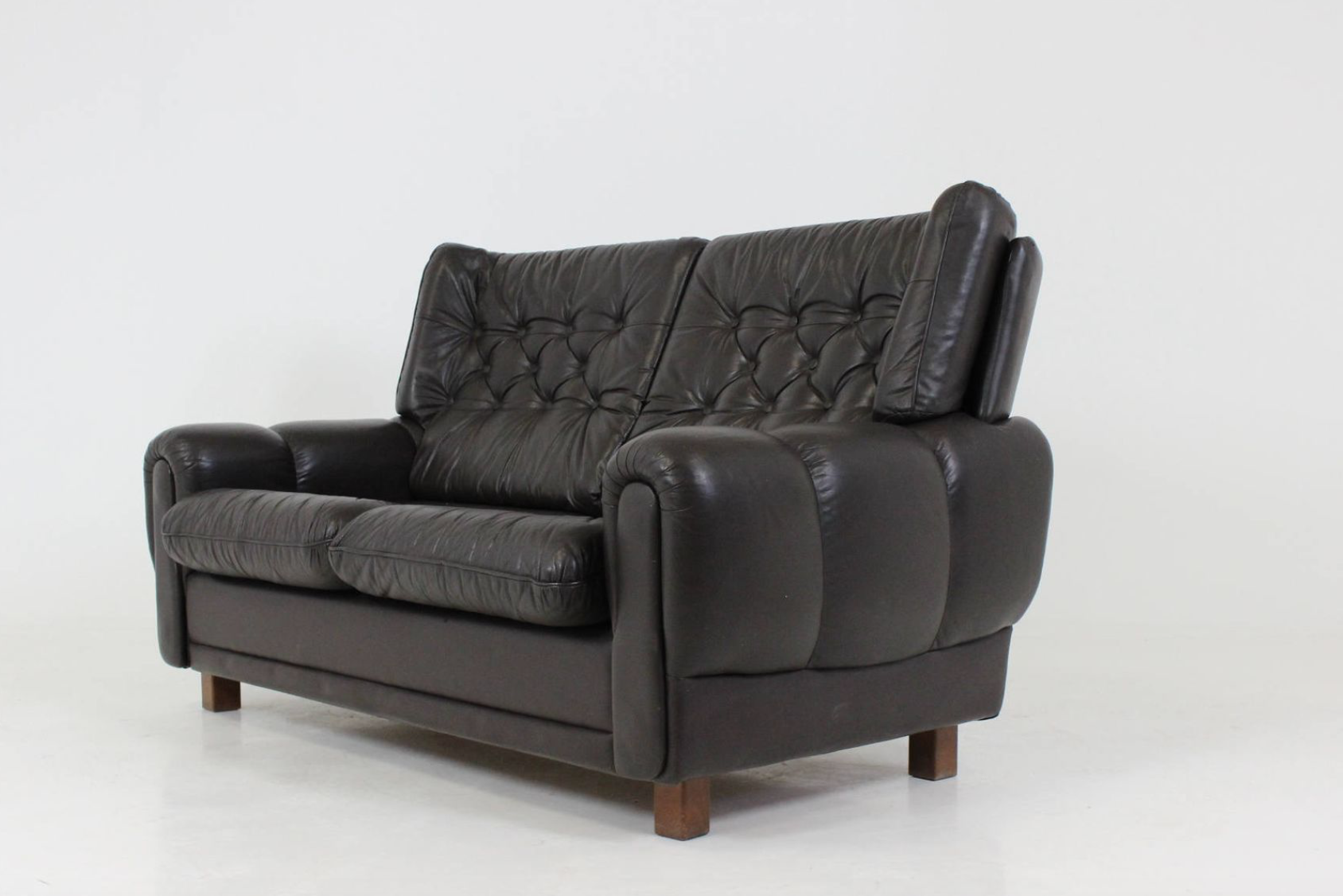 Mid-century black leather sofa