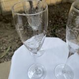 Set of 3 engraved champagne flutes.
