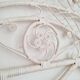 Peacock headboard in white rattan