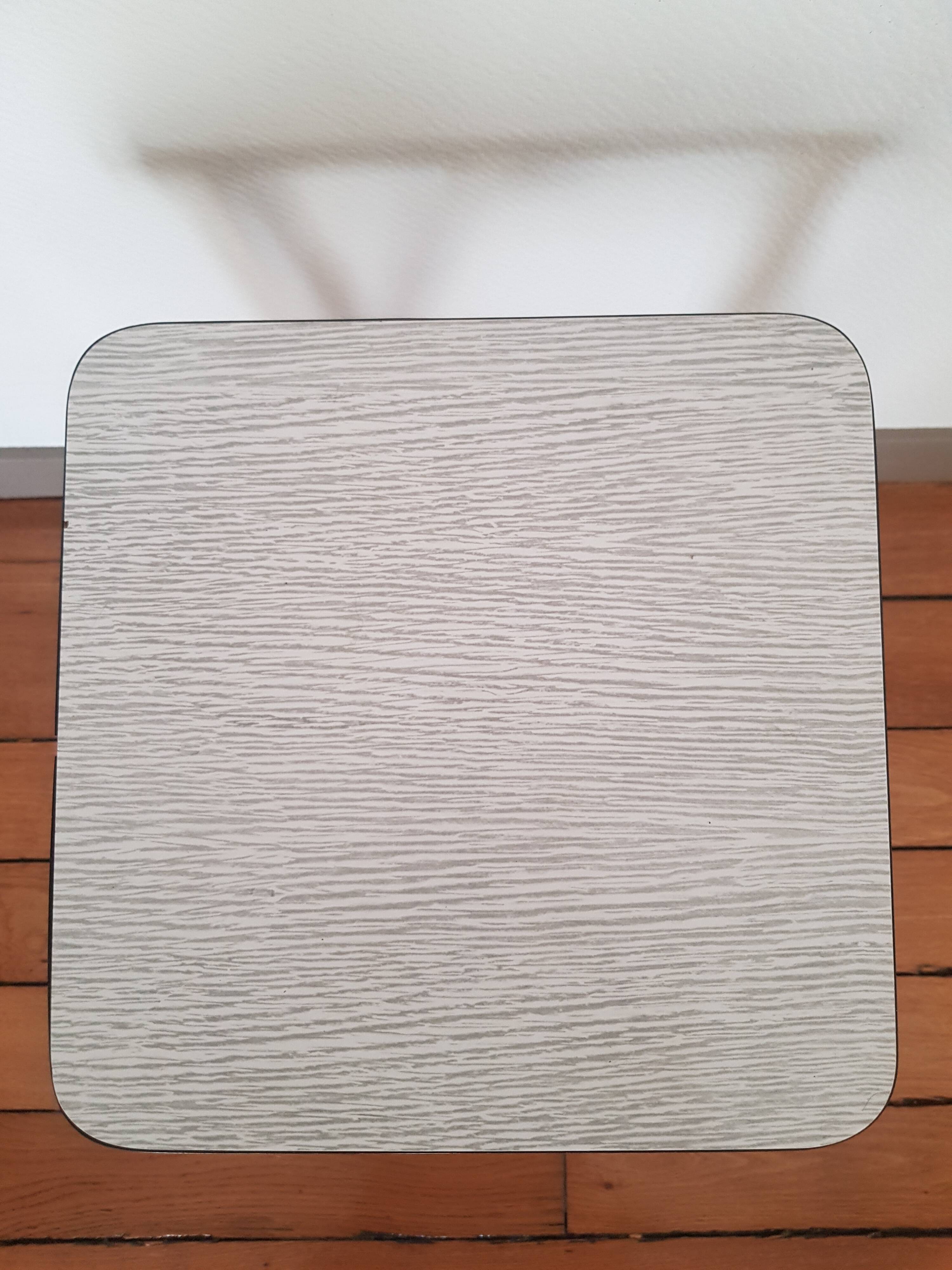 Folding stool in formica