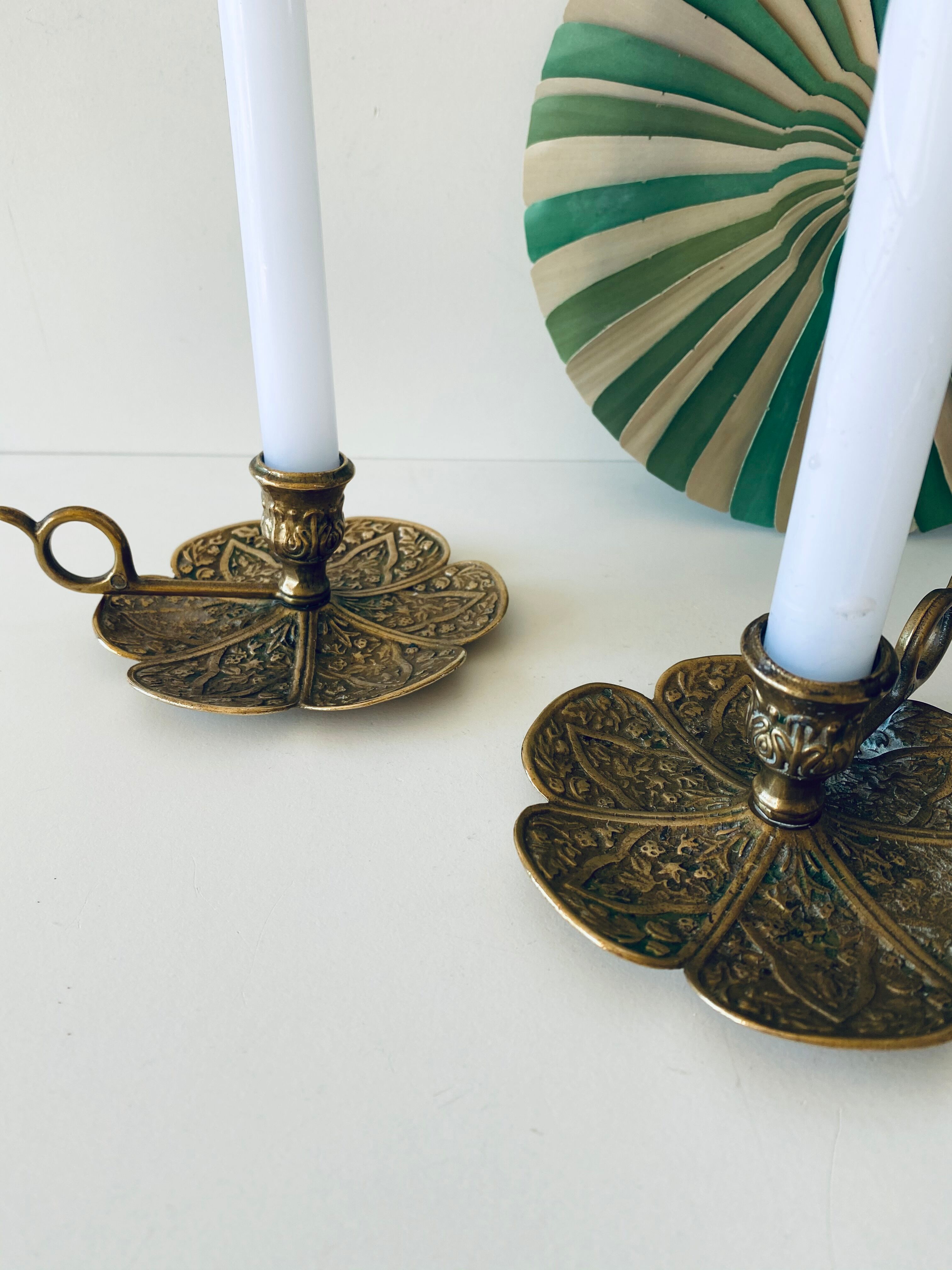 Pair of brass clover candlesticks