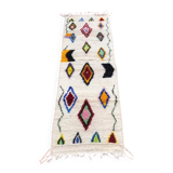 Colourful Moroccan rug made of natural wool. Woven by artisans.