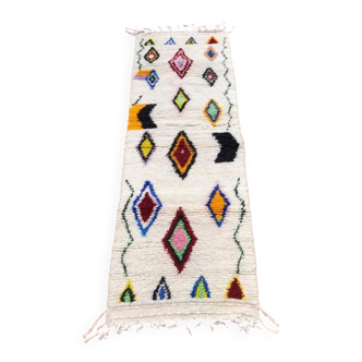 Colourful Moroccan rug made of natural wool. Woven by artisans.