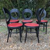 6 vintage Baumann seagull model chairs, black lacquered with red Skai seats.