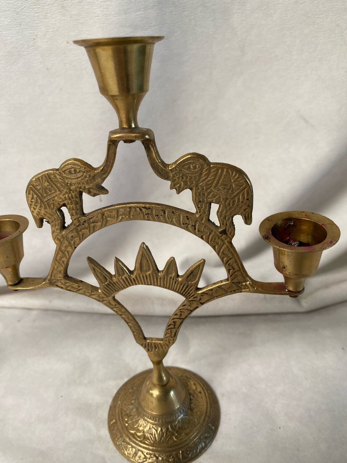 Pair of brass elephant candlesticks