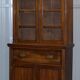 Light wood library with a secretary and leather surface.