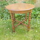 Side table with beaded legs