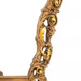 A large mirror in a gold frame, Italy, first half of the 20th century.