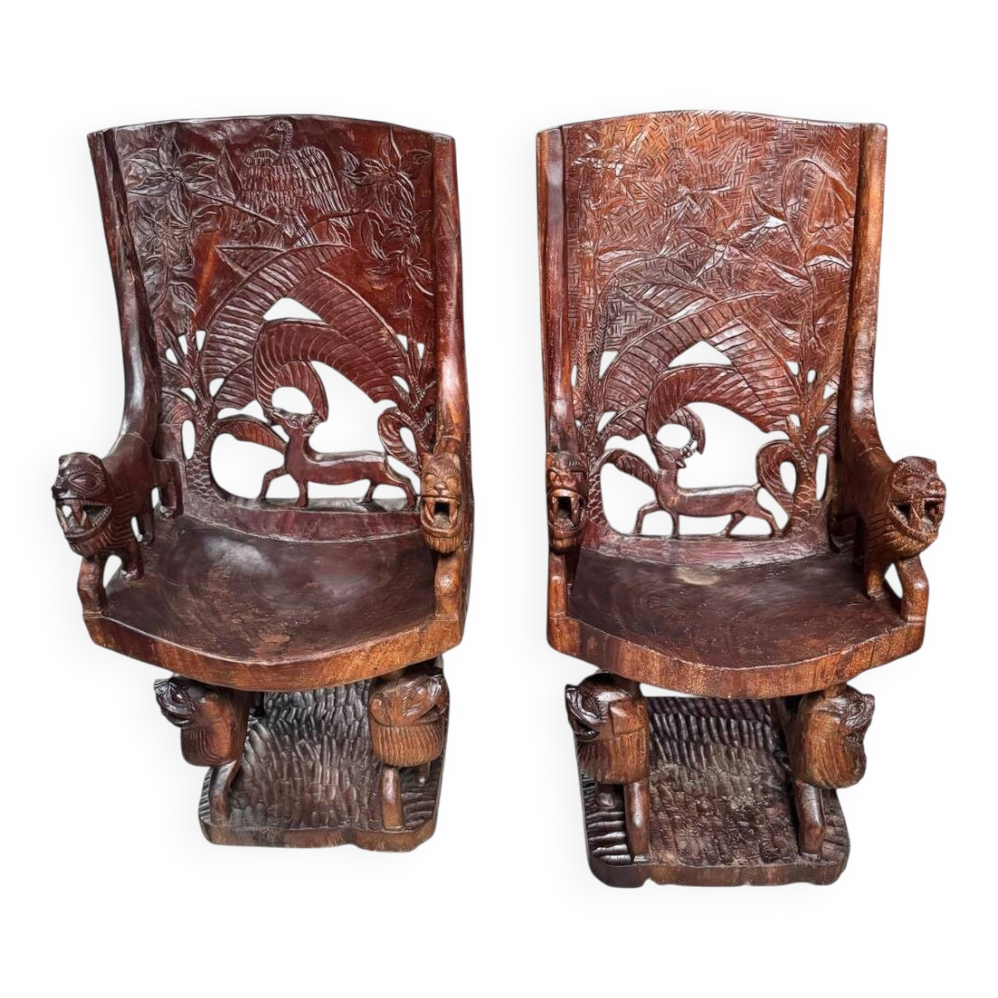 Pair of carved African armchairs