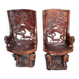 Pair of carved African armchairs