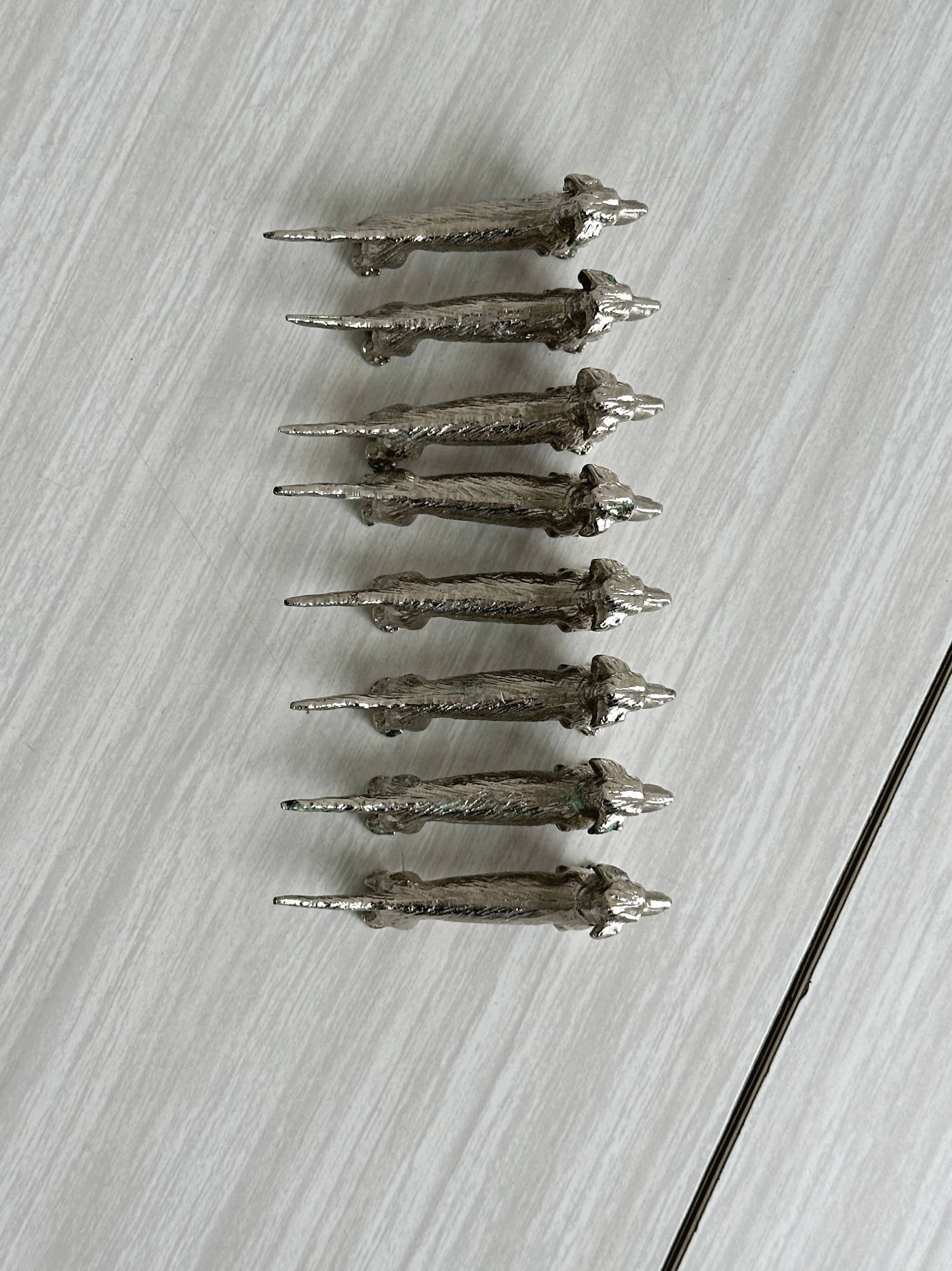 Set of 8 dachshund-shaped knife rests