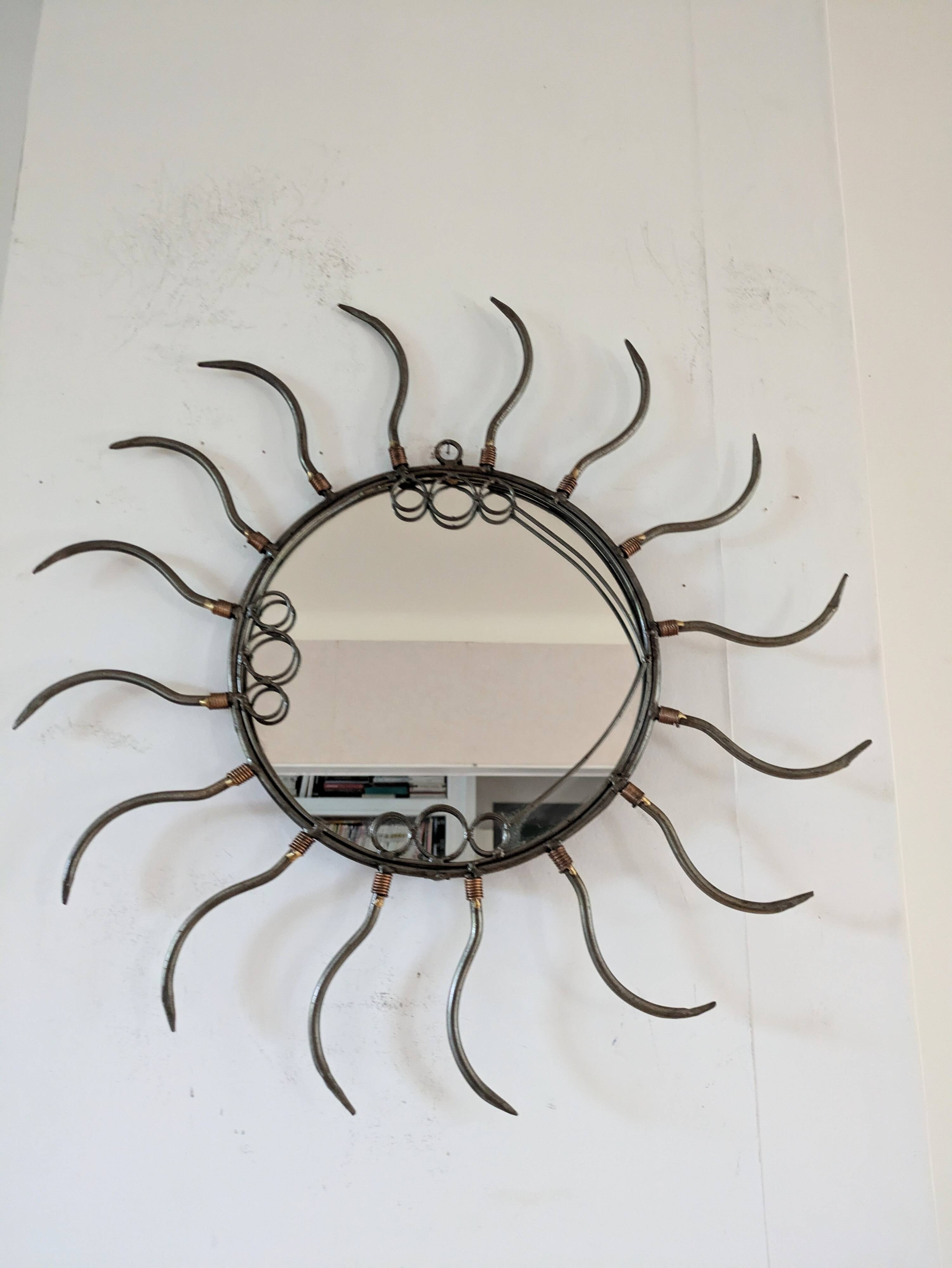 Metal sun mirror