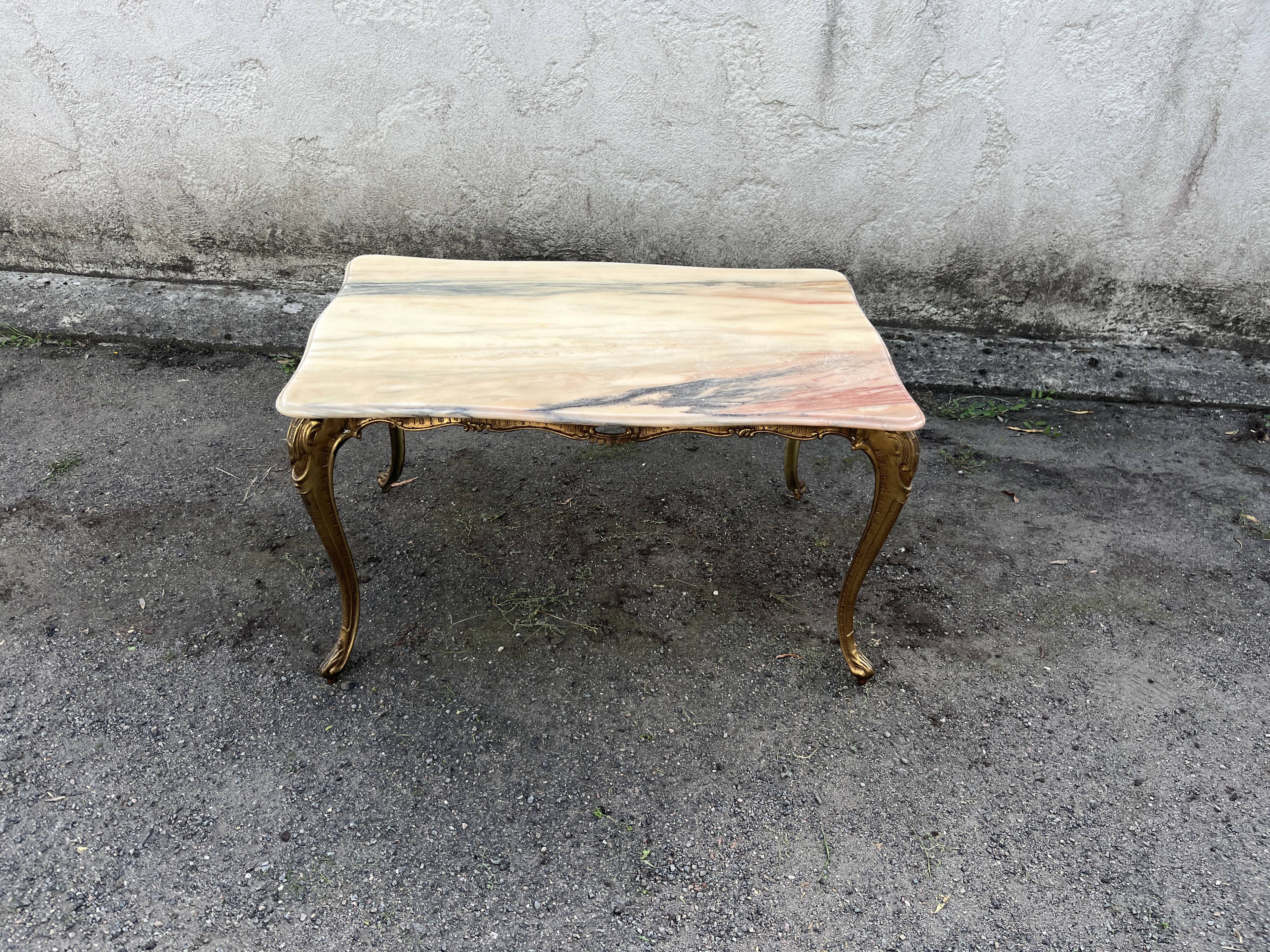 Gilded brass coffee table with onyx top