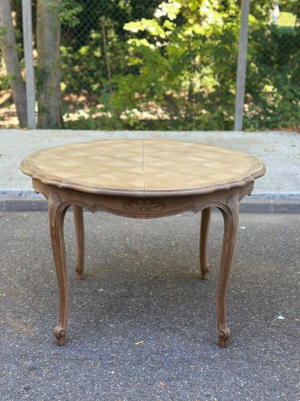 Round extendable dining table Louis XV stripped in solid oak 1950