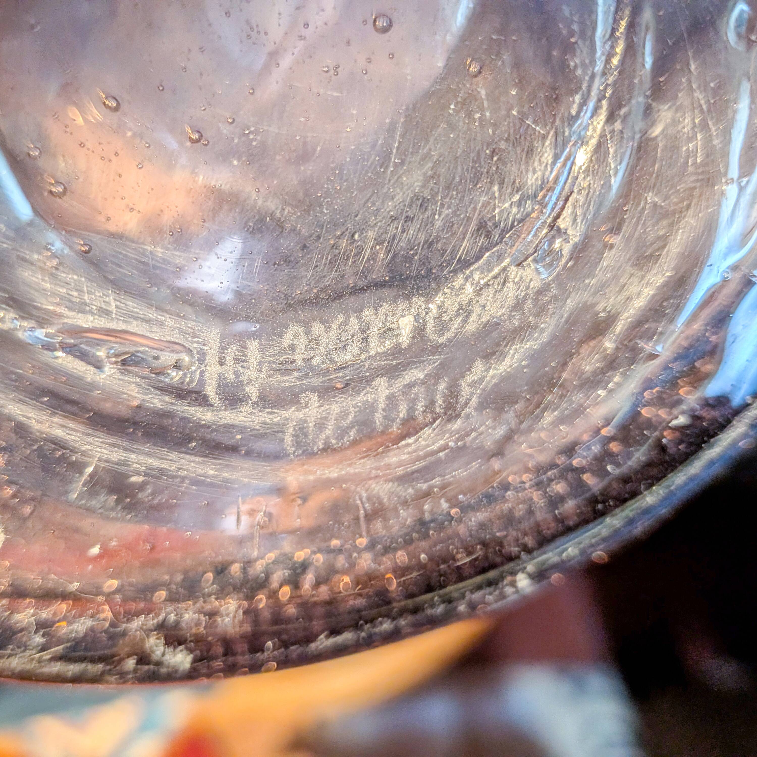 Large ice pitcher from Verrerie de Biot in amethyst bubble glass.