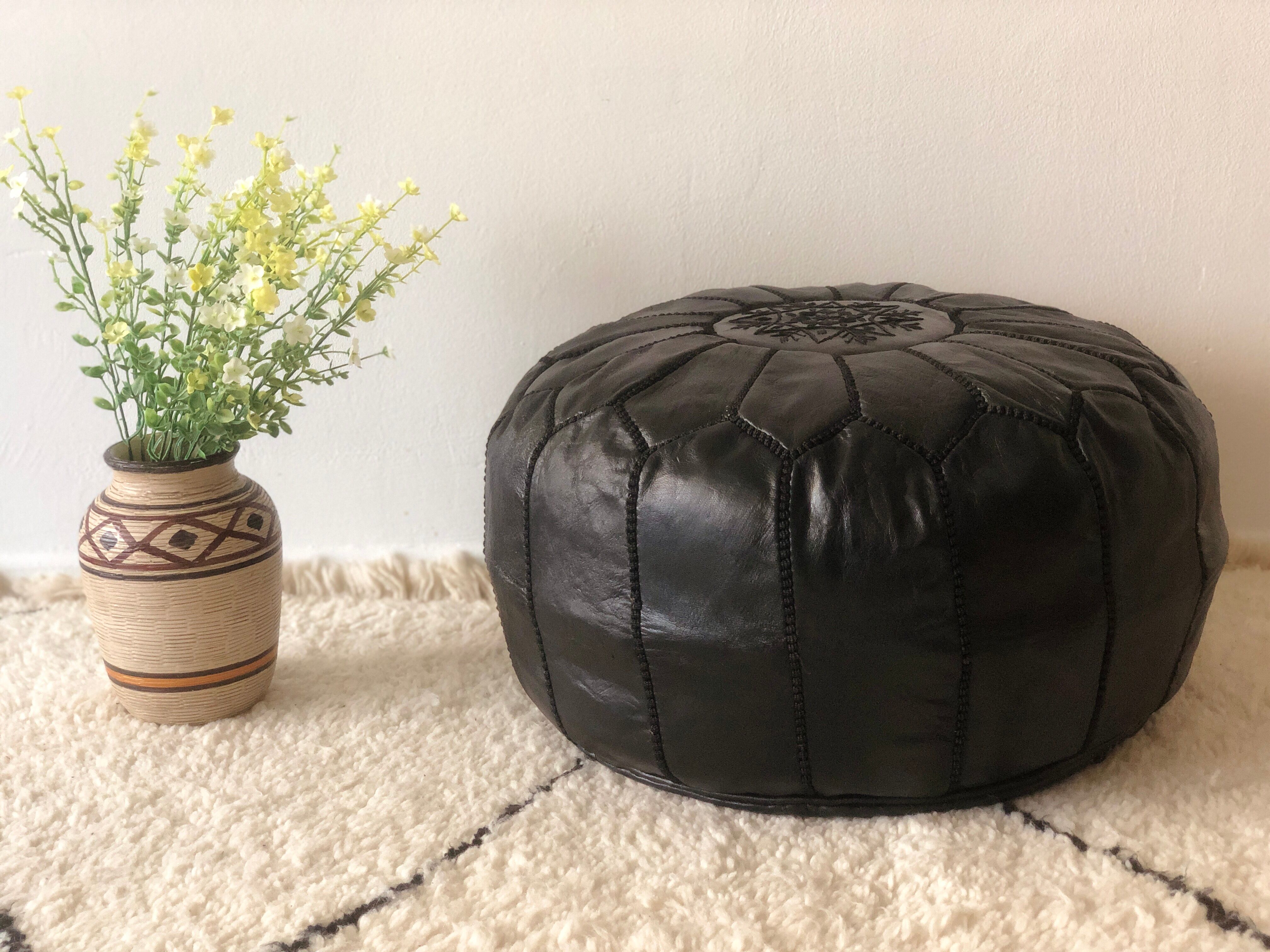 Contemporary leather full black pouf