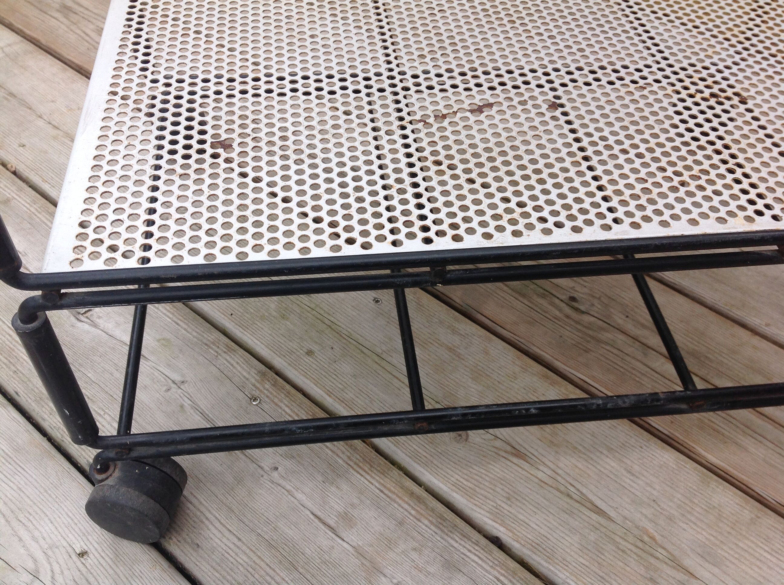 Perforated iron rolling table