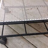 Perforated iron rolling table
