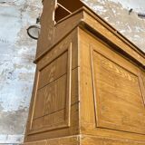 Wooden hardware cabinet painted with wood effect, circa 1940.