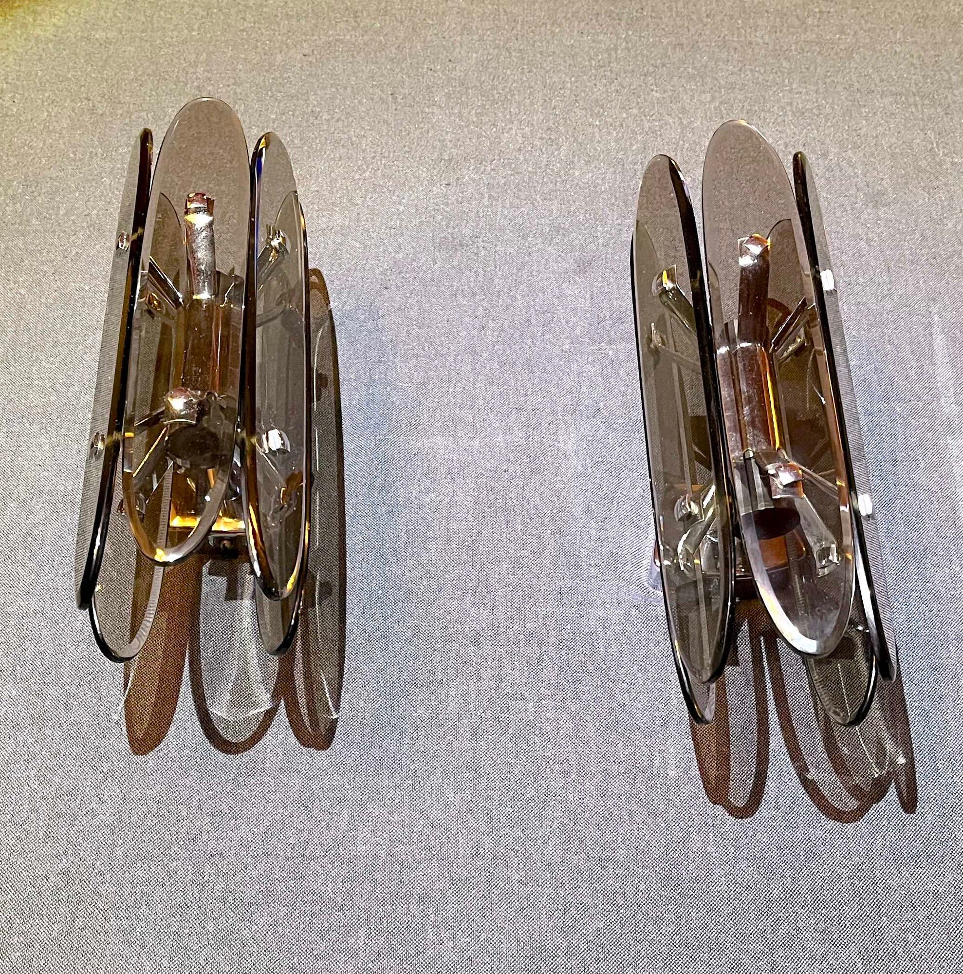 Pair of Italian wall lamp in glass and chrome, 1970's