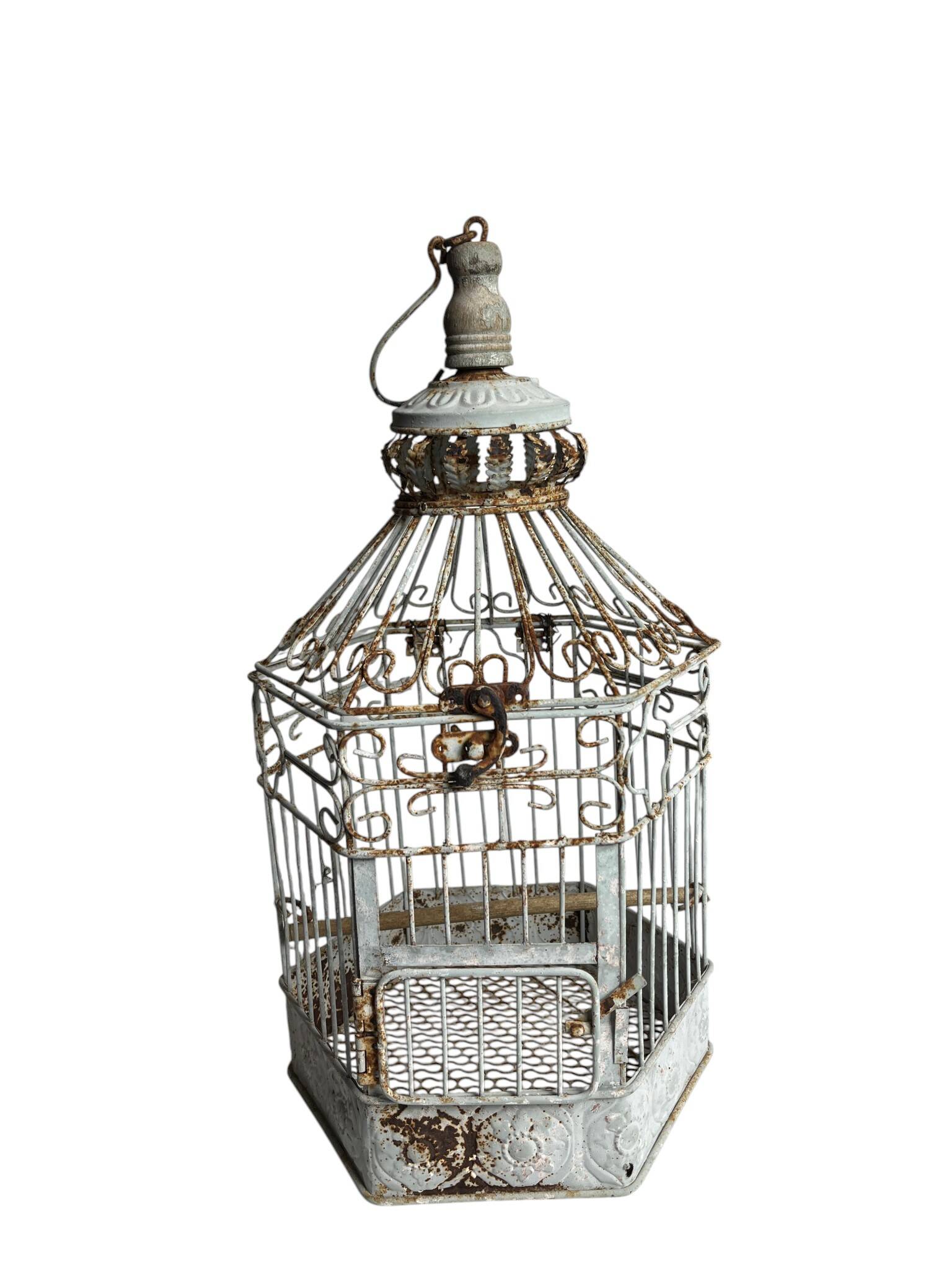 Vintage hexagonal metal birdcage from around 1940.