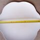 Large white multi-lobed pie or cake dish