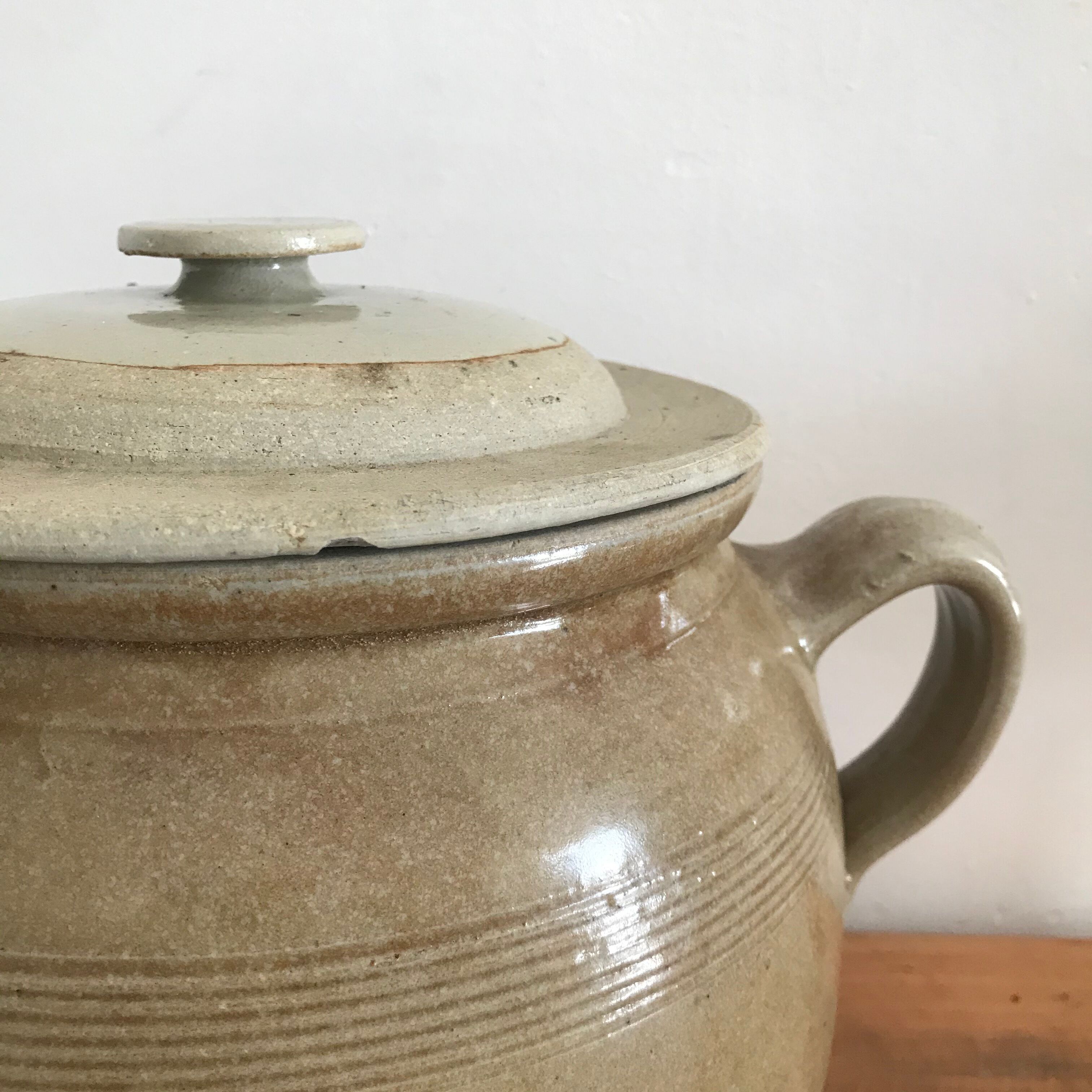 Eared sandstone jar and lid