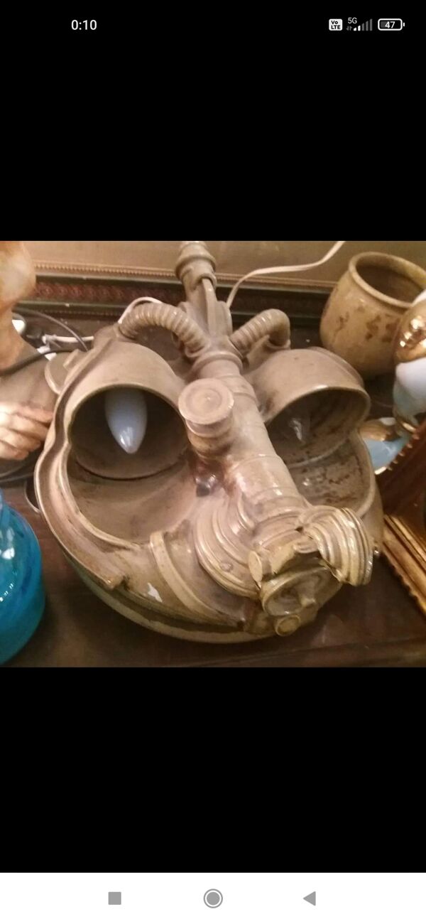 Applique murale en grès vernissé ''tete d'alien''  par joel lurois en 1982