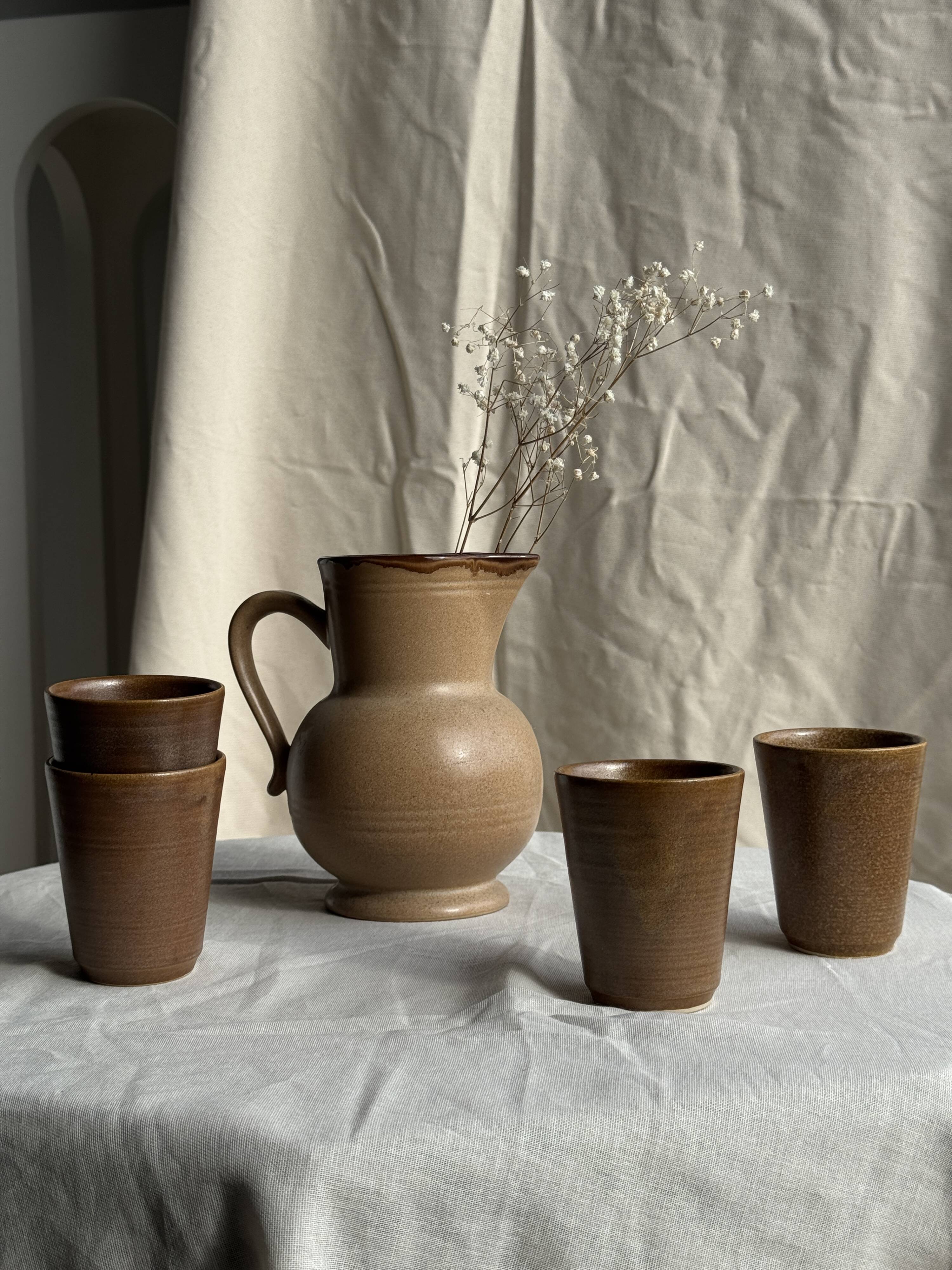 Set of 10 small stoneware mugs from Digoin.