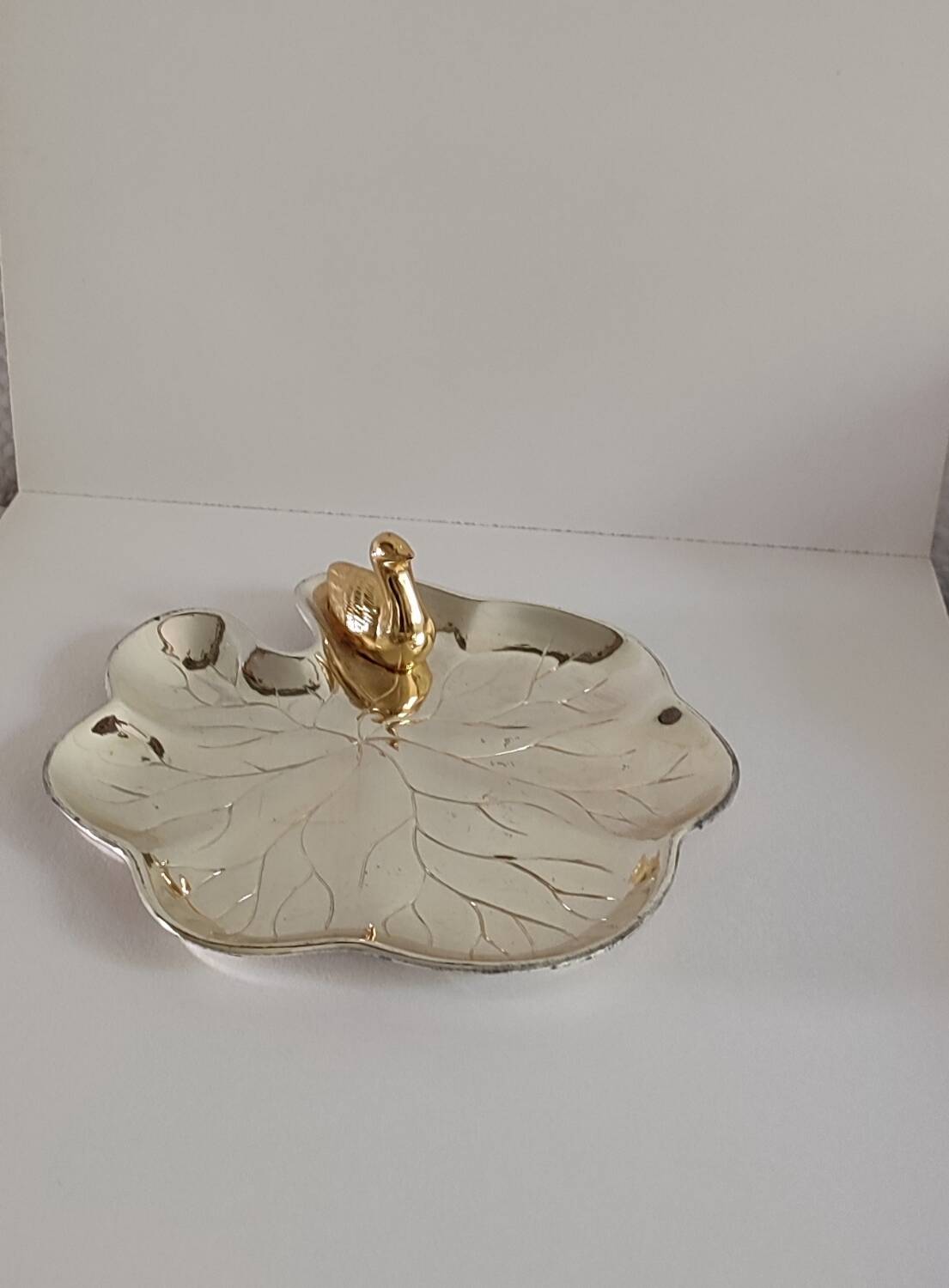 A Lancel pocket tray in silver metal.