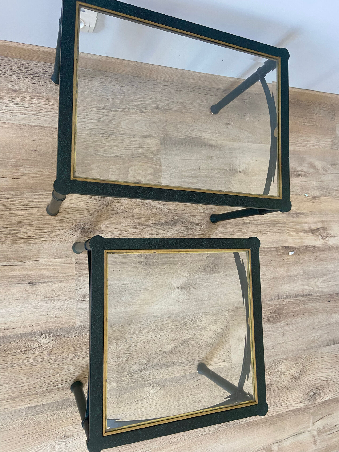 2 nesting tables from the 1960s in metal and bevelled glass.