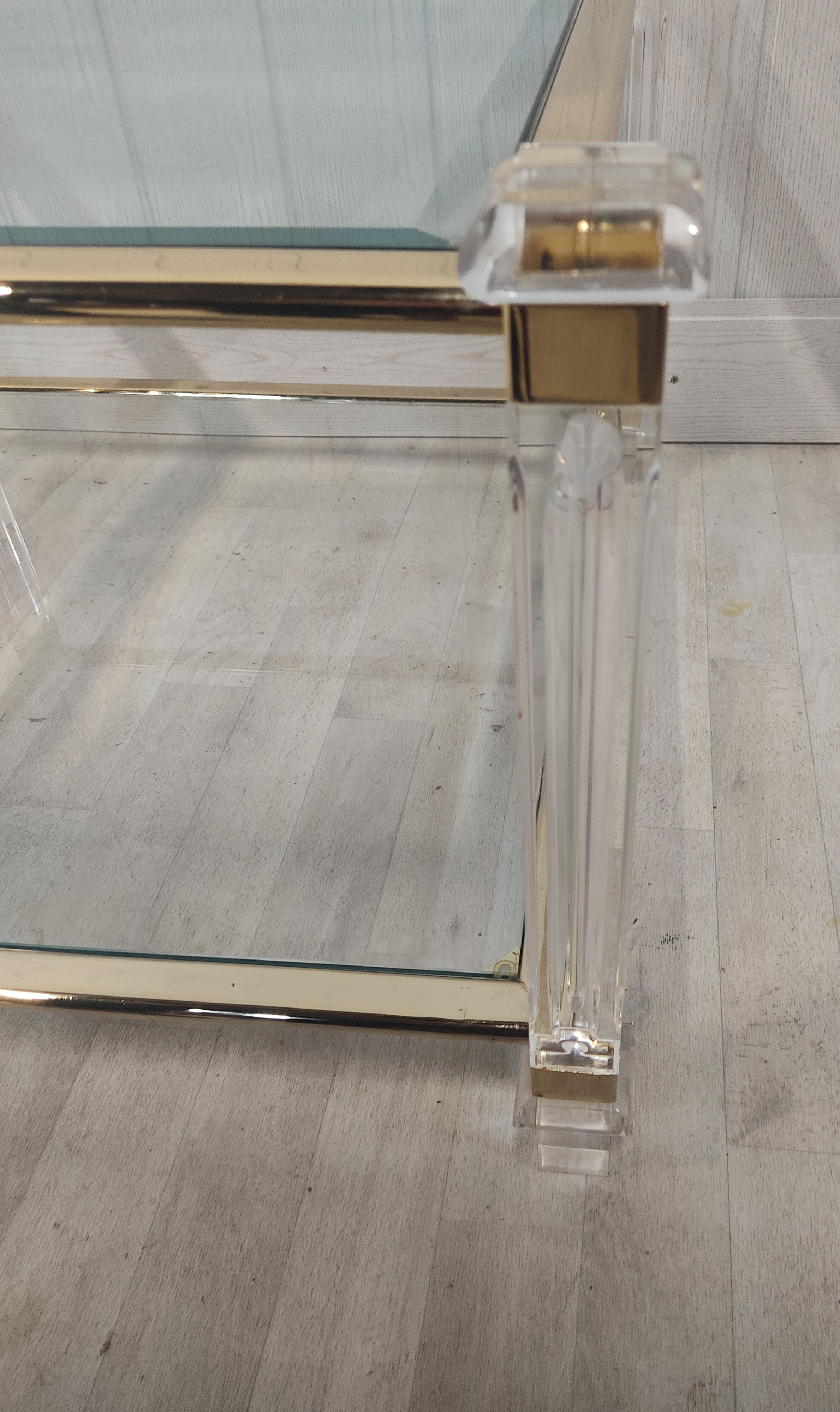 Brass coffee table, beveled glass and altuglas