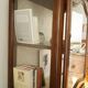 Curved display cabinet in solid walnut, mid-20th century.