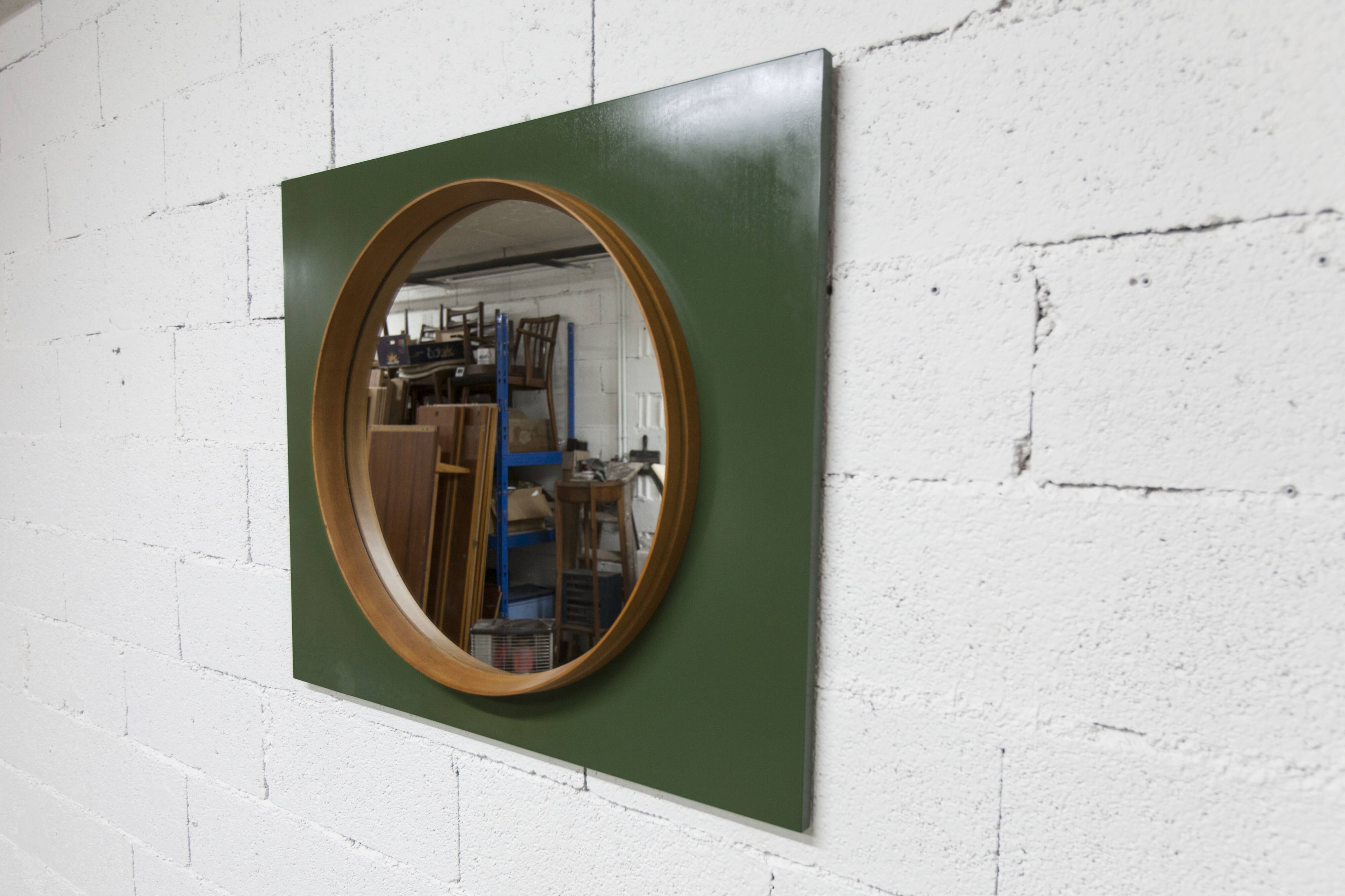 Unusual round wall mirror 60 cm teak edge on green rectangular board 1960.