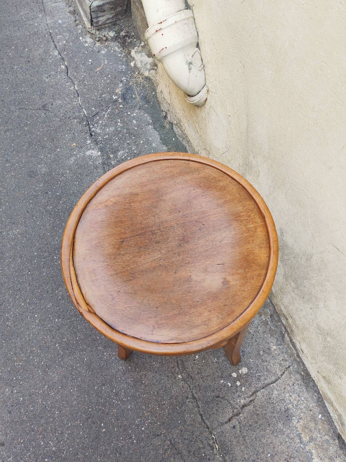 Curved wooden stool
